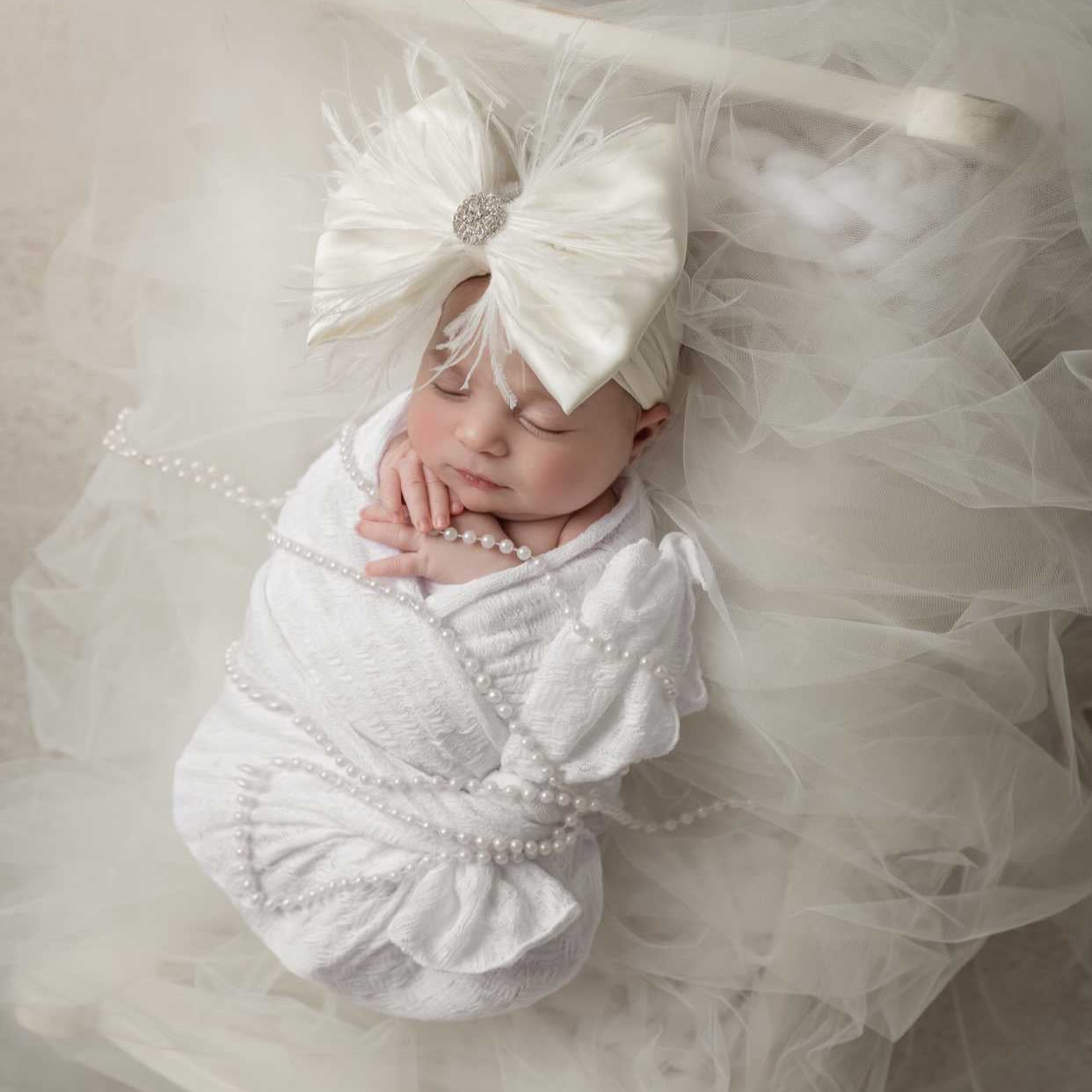 Ivory Satin Bow with Feathers