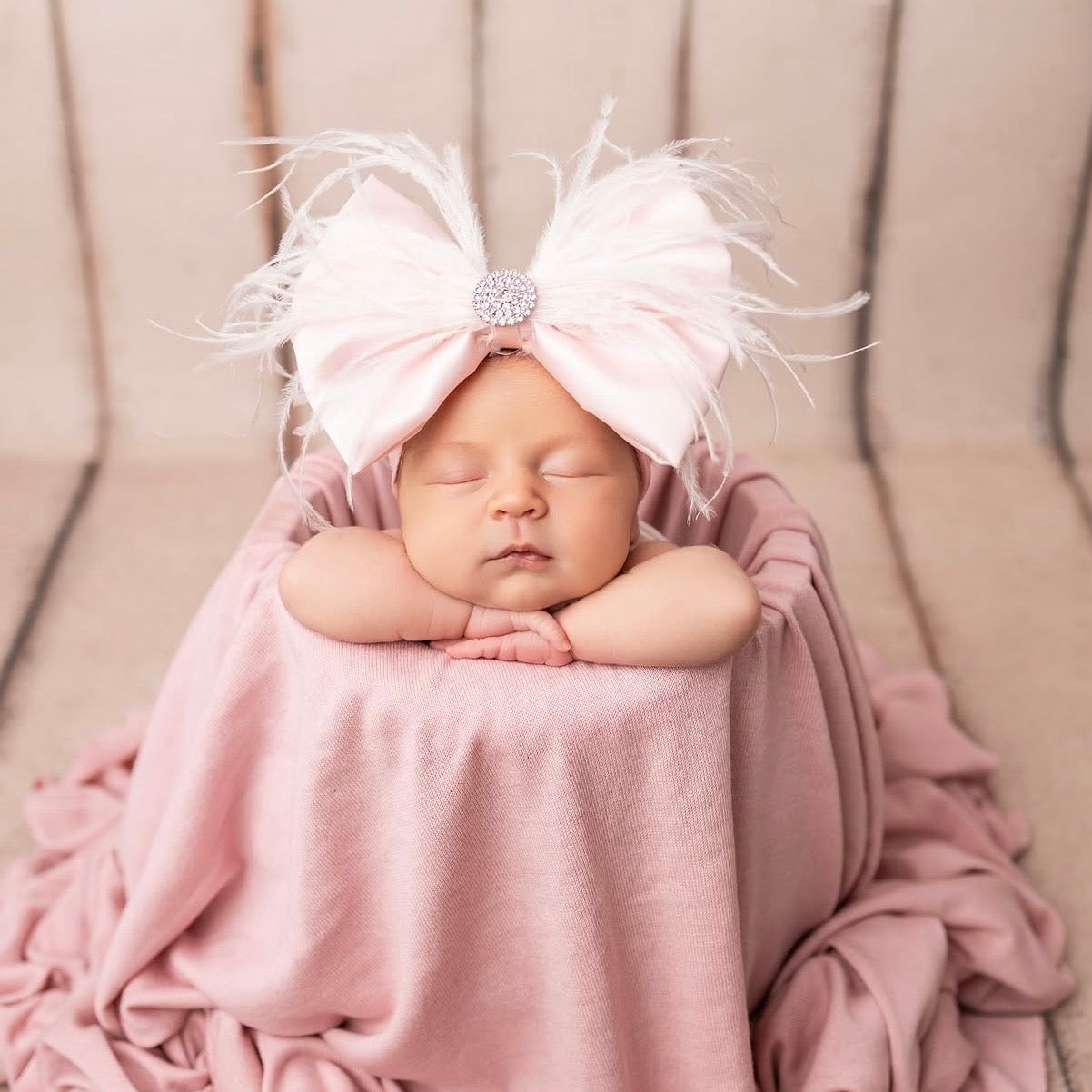 Ice Pink Satin Feather Bow