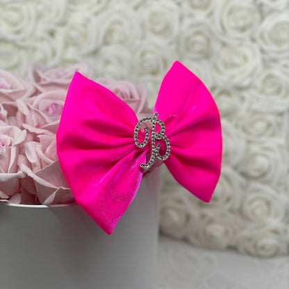 "It Girl" Neon Pink Bow with Rhinestone Initial Brooch